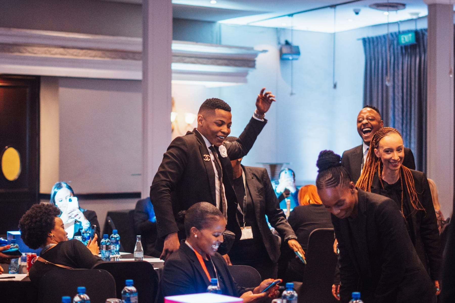 Guests cheering at their tables
