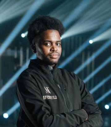 A member of the Sound Ninja crew in a branded jacket