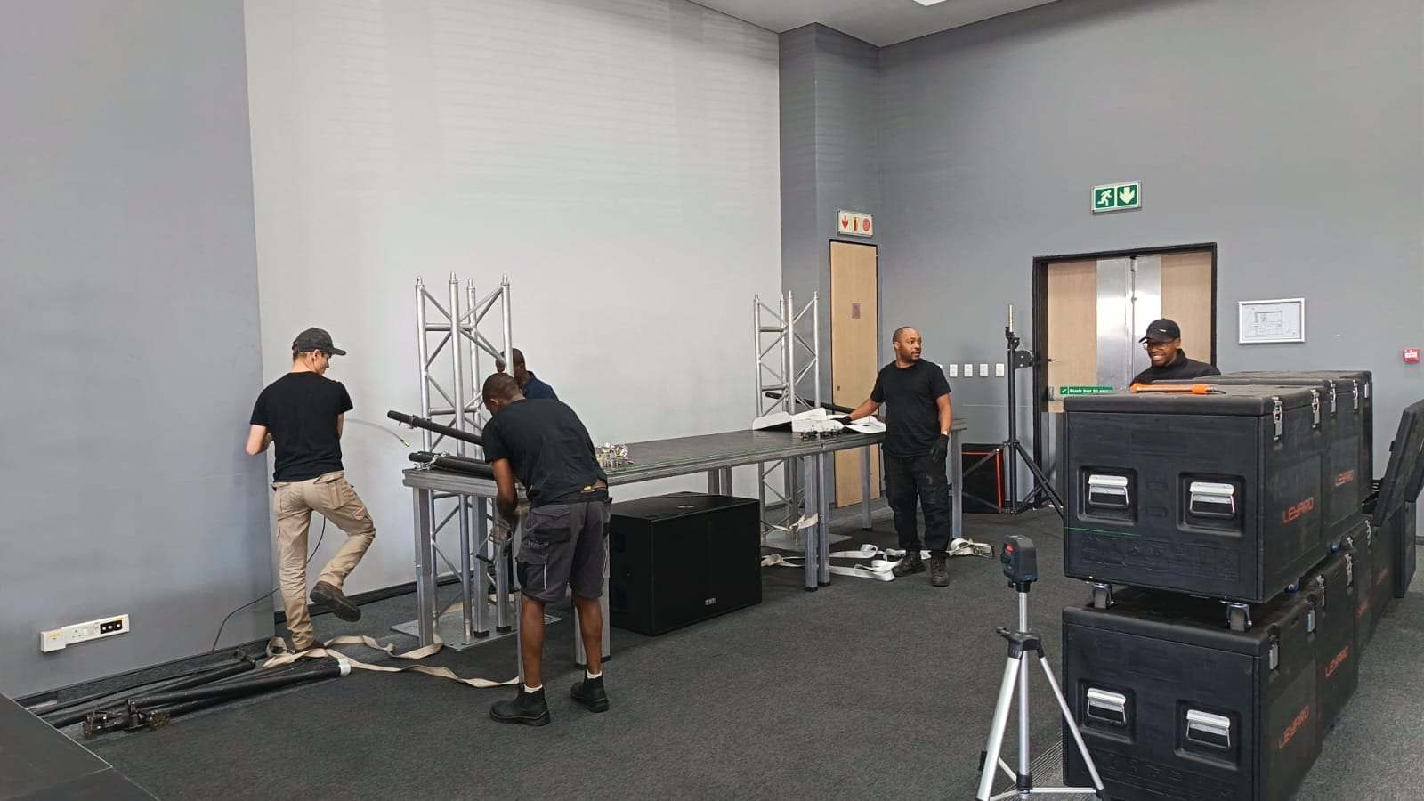 Truss and stage decks going up during the load-in