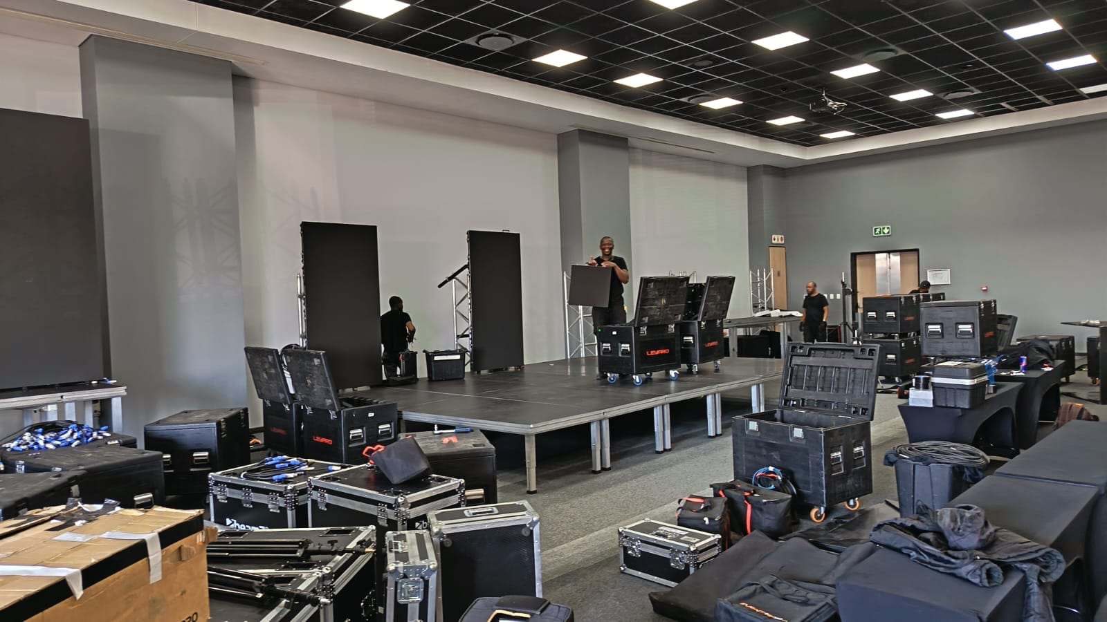 The finished stage decks with lighting flight cases in front