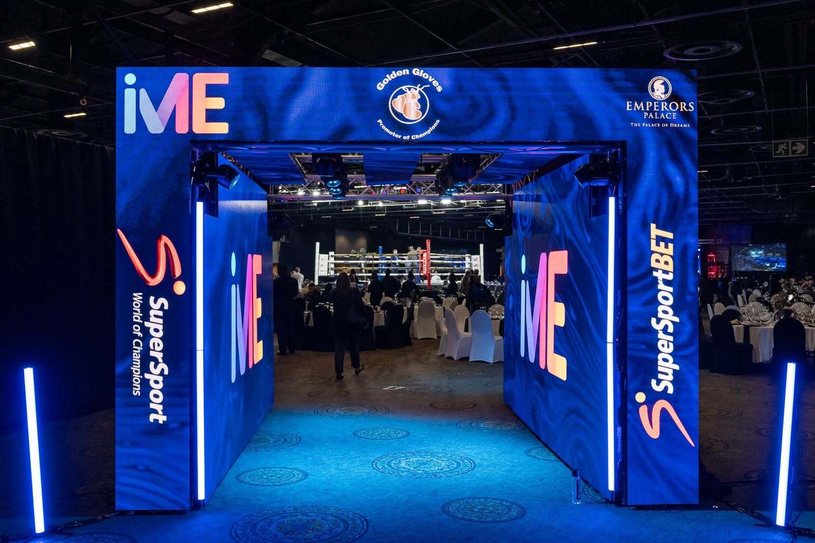 An LED arch walk-in at a SuperSportBet boxing event