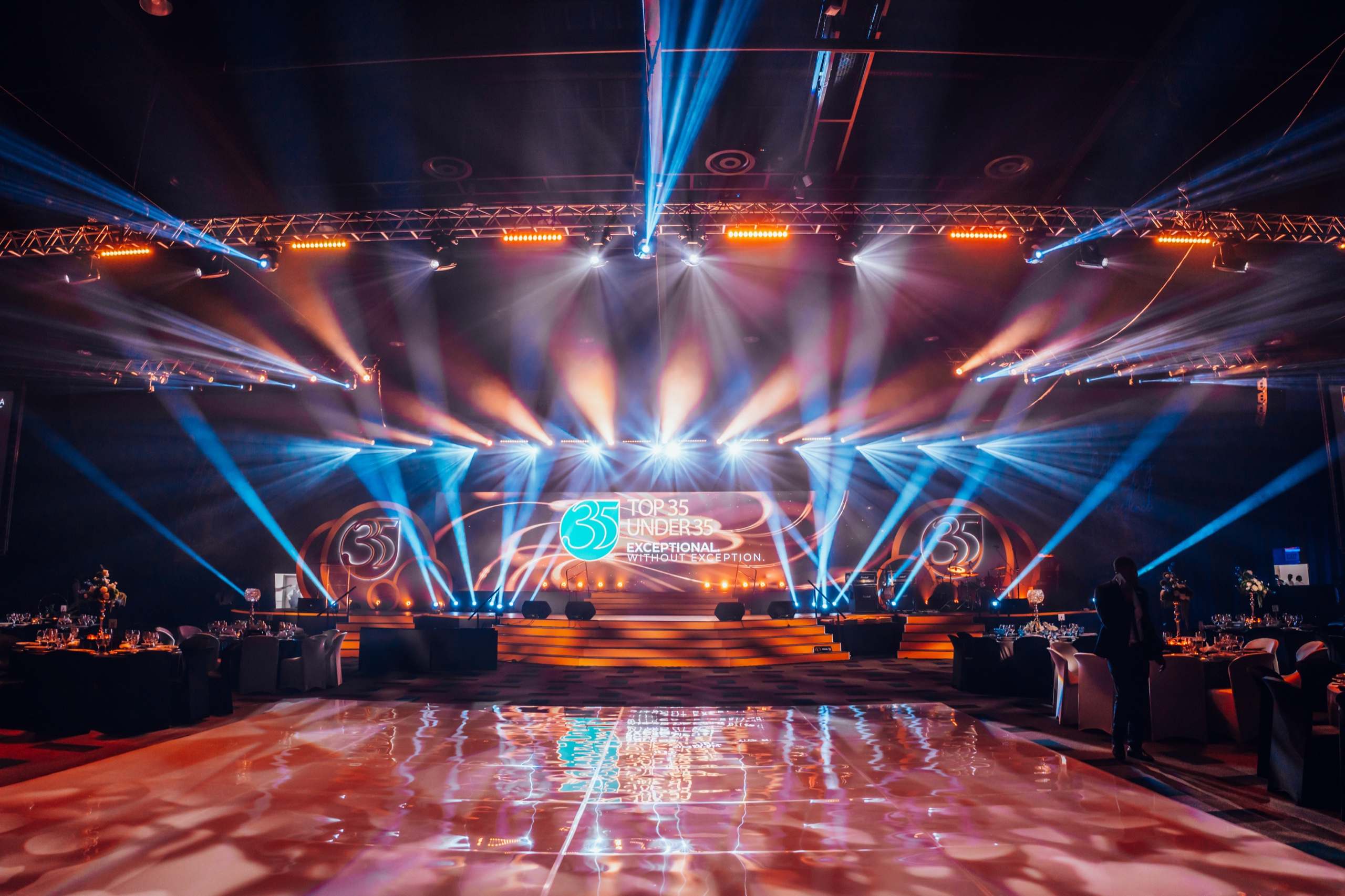 Moving-head beams over a full ballroom and an LED wall at the SAICA Top 35 Under 35 gala