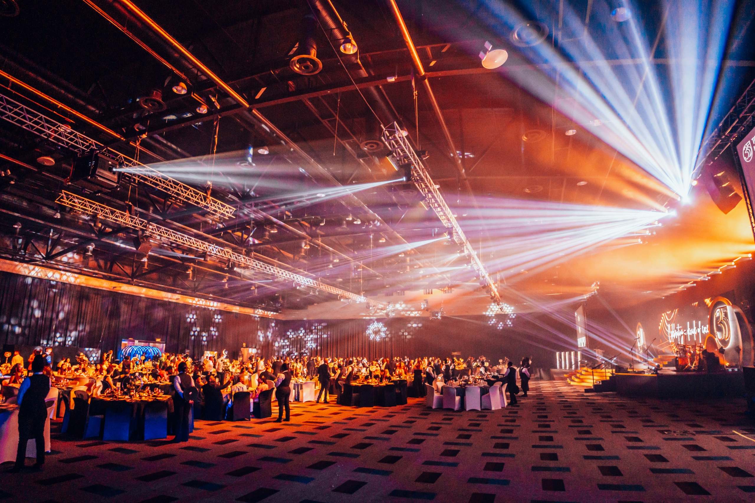 Wide view of the SAICA gala ballroom under the lighting rig