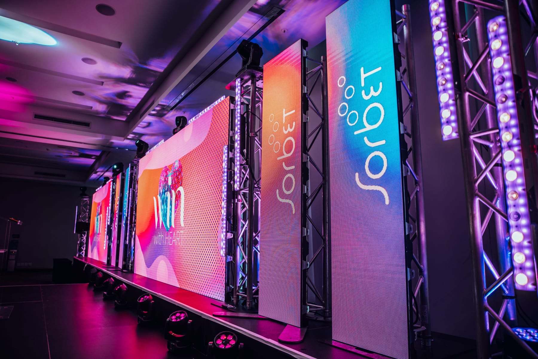 LED towers on truss lined with pixel bars at a Sorbet event