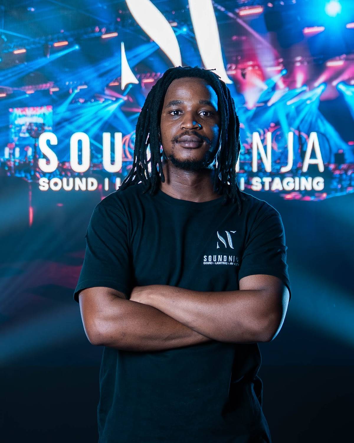 A member of the Sound Ninja team in a Sound Ninja t-shirt