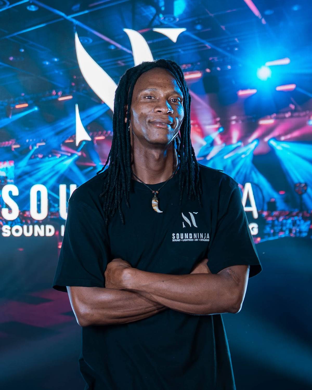 A member of the Sound Ninja team in a Sound Ninja t-shirt